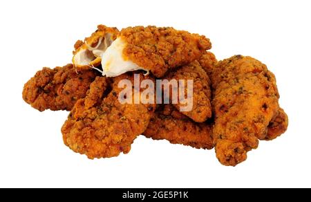 Fried spicy breadcrumb covered chicken fillets isolated on a white background Stock Photo