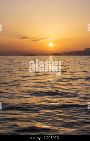 Sunset over the sea, Dodecanese, Greece Stock Photo