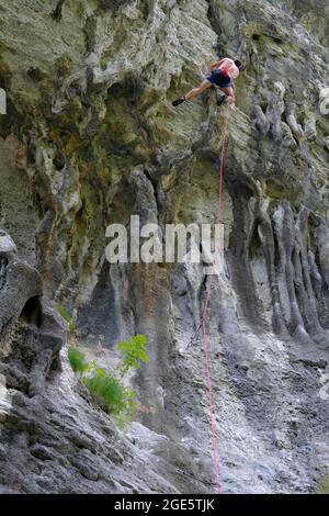 Climbing on a rock face, lead climbing, sport climbing, Buzetski kanjon, climbing area, Istria, Croatia Stock Photo