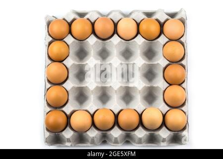 Eggs arranged in a number isolated on white background Stock Photo