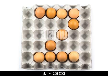 Eggs arranged in a number isolated on white background Stock Photo