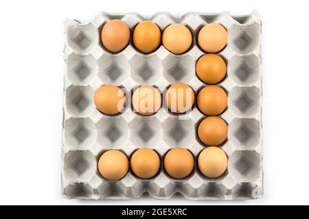 Eggs arranged in a number isolated on white background Stock Photo