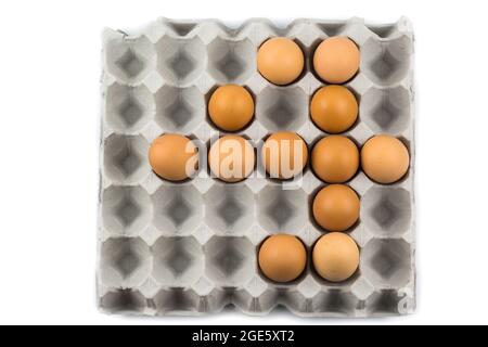 Eggs arranged in a number isolated on white background Stock Photo