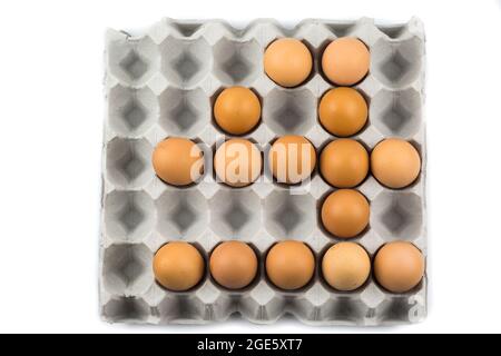 Eggs arranged in a number isolated on white background Stock Photo