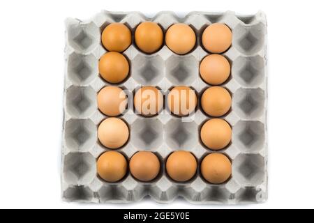 Eggs arranged in a number isolated on white background Stock Photo
