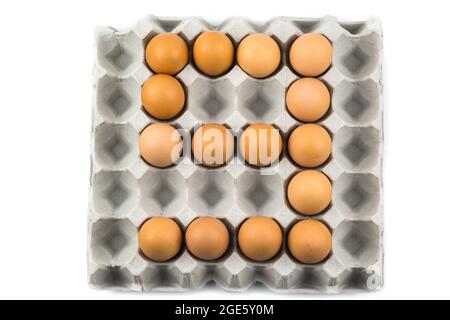 Eggs arranged in a number isolated on white background Stock Photo