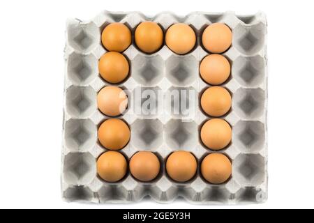 Eggs arranged in a number isolated on white background Stock Photo