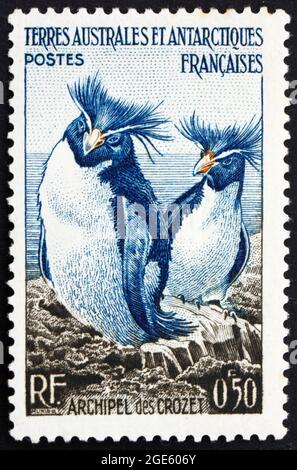 FRENCH SOUTHERN AND ANTARCTIC TERRITORIES - CIRCA 1956: a stamp printed in the France shows Rockhopper Penguins, Eudyptes Crysocome, Crozet Archipelag Stock Photo