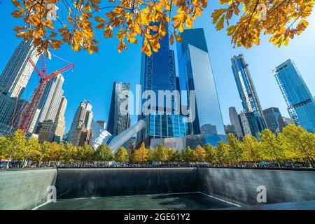 NEW YORK CITY - October 25, 2019 :  9/11 Memorial at World Trade Center Ground Zero in downtown Manhattan, NYC USA Stock Photo