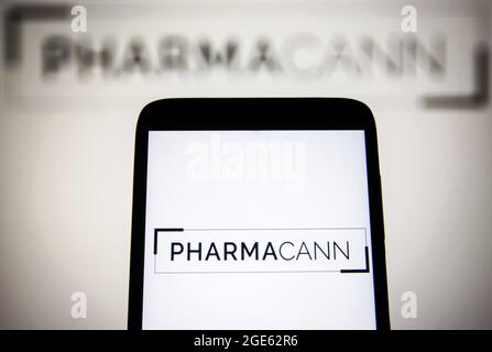 Ukraine. 16th Aug, 2021. In this photo illustration a PharmaCann logo is seen on a smartphone and a pc screen. Credit: SOPA Images Limited/Alamy Live News Stock Photo