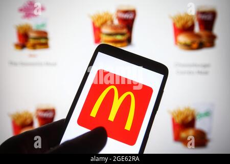 Ukraine. 16th Aug, 2021. In this photo illustration a McDonald's logo is seen on a smartphone with it's website in the background. Credit: SOPA Images Limited/Alamy Live News Stock Photo