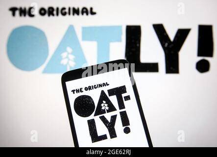 Ukraine. 16th Aug, 2021. In this photo illustration an Oatly Group AB logo is seen on a smartphone and a pc screen. Credit: SOPA Images Limited/Alamy Live News Stock Photo