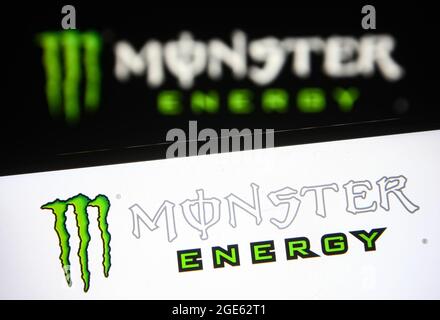 Ukraine. 16th Aug, 2021. In this photo illustration a Monster Energy logo is seen on a smartphone and a pc screen. Credit: SOPA Images Limited/Alamy Live News Stock Photo