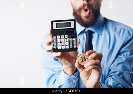 power calculator cryptocurrency bitcoin price increase economy investment Stock Photo