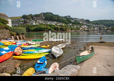 Small colourful boats at low tide on the River Yealm at Newton Ferrers looking towards Noss Mayo, South Devon, England, UK Stock Photo