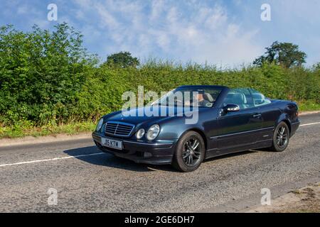 2000 blue Mercedes Benz CLK 320 Elegance auto 3200cc petrol cabrio en-route to Capesthorne Hall classic July car show, Cheshire, UK. private number plate, personalised reg, cherished dateless registrations, registration marks Stock Photo