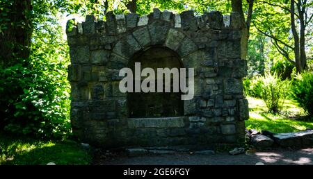 stone monument in the middle of halifax public gardens Stock Photo