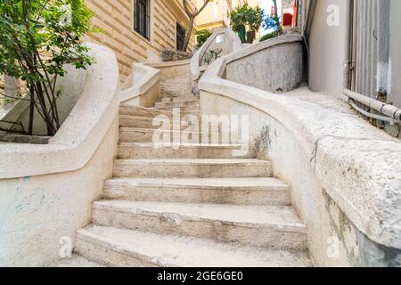 Kamondo Stairs, a famous pedestrian stairway leading to Galata Tower, built around 1870, located on Banks Street in Galata, Karakoy district of Istanbul, Turkey Stock Photo