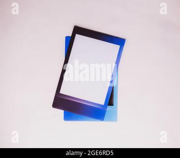 Two blank photo frame on white background as template for graphic design. Photo cards for your logo or text. Stock Photo