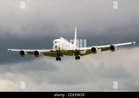 Boeing E-6B Mercury airborne command post and communications, control of nuclear weapons relay based on Boeing 707 jet plane. Landing in stormy clouds Stock Photo