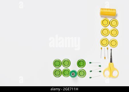 Sewing items from above. Flat lay composition with sewing accessories on light color background. Items for sewing, Sewing clothes, measuring tape Stock Photo