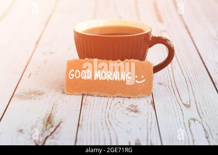 Good Morning note with cup of coffee Stock Photo