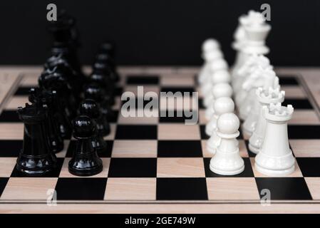 Black and White Chess Board on Black Background Stock Photo