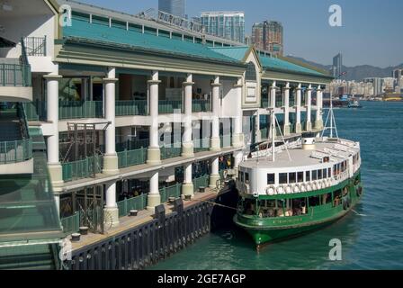 Star Ferry berthing at terminal, Central Pier, Sheung Wan, Victoria Harbour, Hong Kong Island, Hong Kong, China Stock Photo