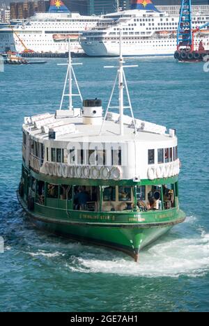 Star Ferry berthing at terminal, Central Pier, Sheung Wan, Victoria Harbour, Hong Kong Island, Hong Kong, People’s Republic of China Stock Photo