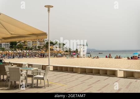 Palmanova, Spain; july 10 2021: General view of the beach of the tourist resort of Palmanova on the island of Mallorca, a very hot summer morning Stock Photo