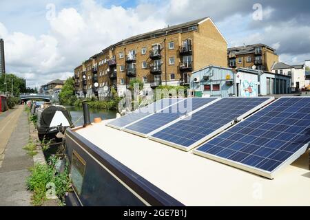 Boats with solar panels along Little Venice, From Warwick Ave to Ladbroke Grove, in London  England, U.K Stock Photo