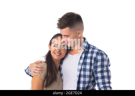 Portrait of a beautiful young happy smiling couple isolated on white background Stock Photo