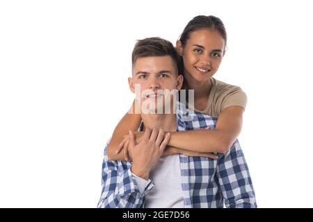 Beautiful young couple smiling isolated on white Stock Photo - Alamy