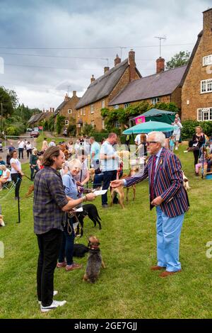 UK, England, Oxfordshire, Wroxton, annual church fete in progress, dog show on village green Stock Photo