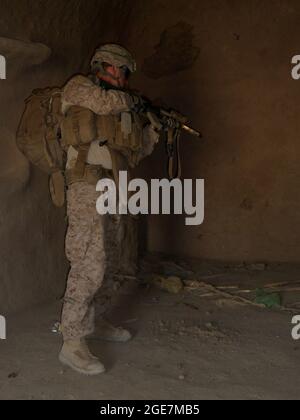 U.S. combat troops on patrol in Afghanistan. Stock Photo