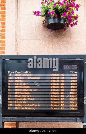 Illuminated digital bus timetable, Loughborough, England. Stock Photo