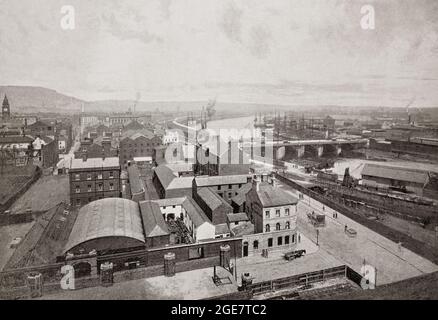 The third of three late 19th century panoramic views of Belfast, the capital and largest city of Northern Ireland, standing on the banks of the River Lagan on the east coast.  Belfast was a major port playing an important role in the Industrial Revolution in Ireland, earning it the nickname 'Linenopolis' as a major centre of Irish linen production, tobacco-processing and rope-making. Shipbuilding was also a key industry; the Harland and Wolff shipyard, which built the RMS Titanic, was the world's largest shipyard and it can be seen at the side of the river beyond Queens Bridge. Stock Photo