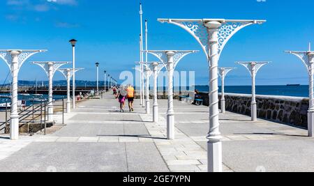 The old Victorian cast iron shelter on the East Per in Dun Laoghaire, Dublin, Ireland. The roof was damaged during Storm Emma in 2018. Stock Photo