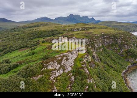 Aerial view of Castle Varrich.  In the far north of the Scottish Highlands, near the village of Tongue. The castle is on a local high point of rock. Stock Photo