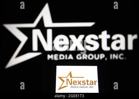 Ukraine. 17th Aug, 2021. In this photo illustration, Nexstar Media Group, Inc. logo is seen on a smartphone and a pc screen. (Photo by Pavlo Gonchar/SOPA Images/Sipa USA) Credit: Sipa USA/Alamy Live News Stock Photo