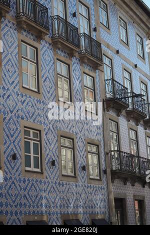 Facade of typical building in azulejos in the city center of Porto, Portugal Stock Photo