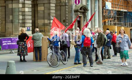 Edinburgh, Scotland, UK, 17th AUGUST, 2021. Unite union care home Protesters demonstrated outside the City Chambers protest on the royal mile during the Edinburgh festival as care workers try to keep cuts from closing homes. Credit: Gerard Ferry/Alamy Live News Stock Photo