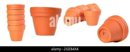 Small clay pots for plant breeding. Containers for growing small seedlings of various plants. Isolated background. Stock Photo