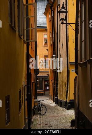 One of the narrow streets in Stockholm's Old Town, Gamla Stan. Stockholm, Sweden Stock Photo