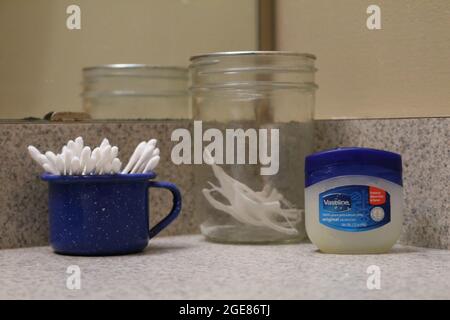 Vaseline, ear swabs and dental floss toothpick Stock Photo