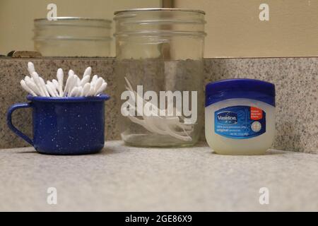 Vaseline, ear swabs and dental floss toothpick Stock Photo