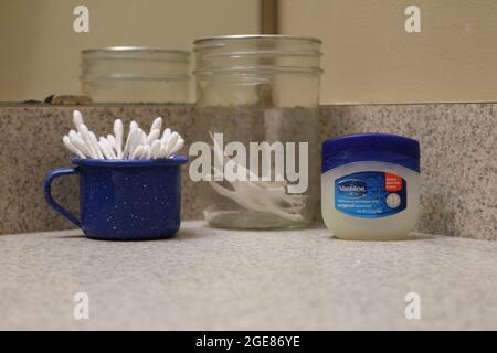 Vaseline, ear swabs and dental floss toothpick Stock Photo