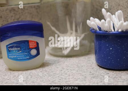 Vaseline, ear swabs and dental floss toothpick Stock Photo