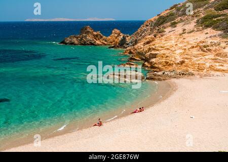 PSILI AMMOS, CRETE - 15 JULY 2021: People on the secluded beach of Psilio Ammos beach next to Vai in Eastern Crete Stock Photo