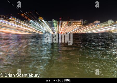 Abstract Wellington urban night lights across harbor in zoom blur photographic effect Stock Photo